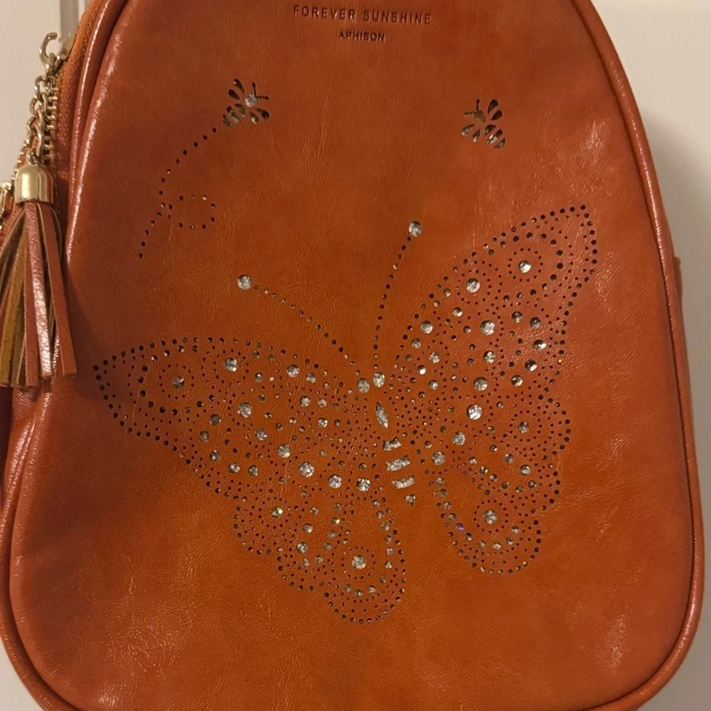 Elegant Tan Butterfly Backpack